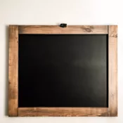 Front view of fold-out table with chalkboard